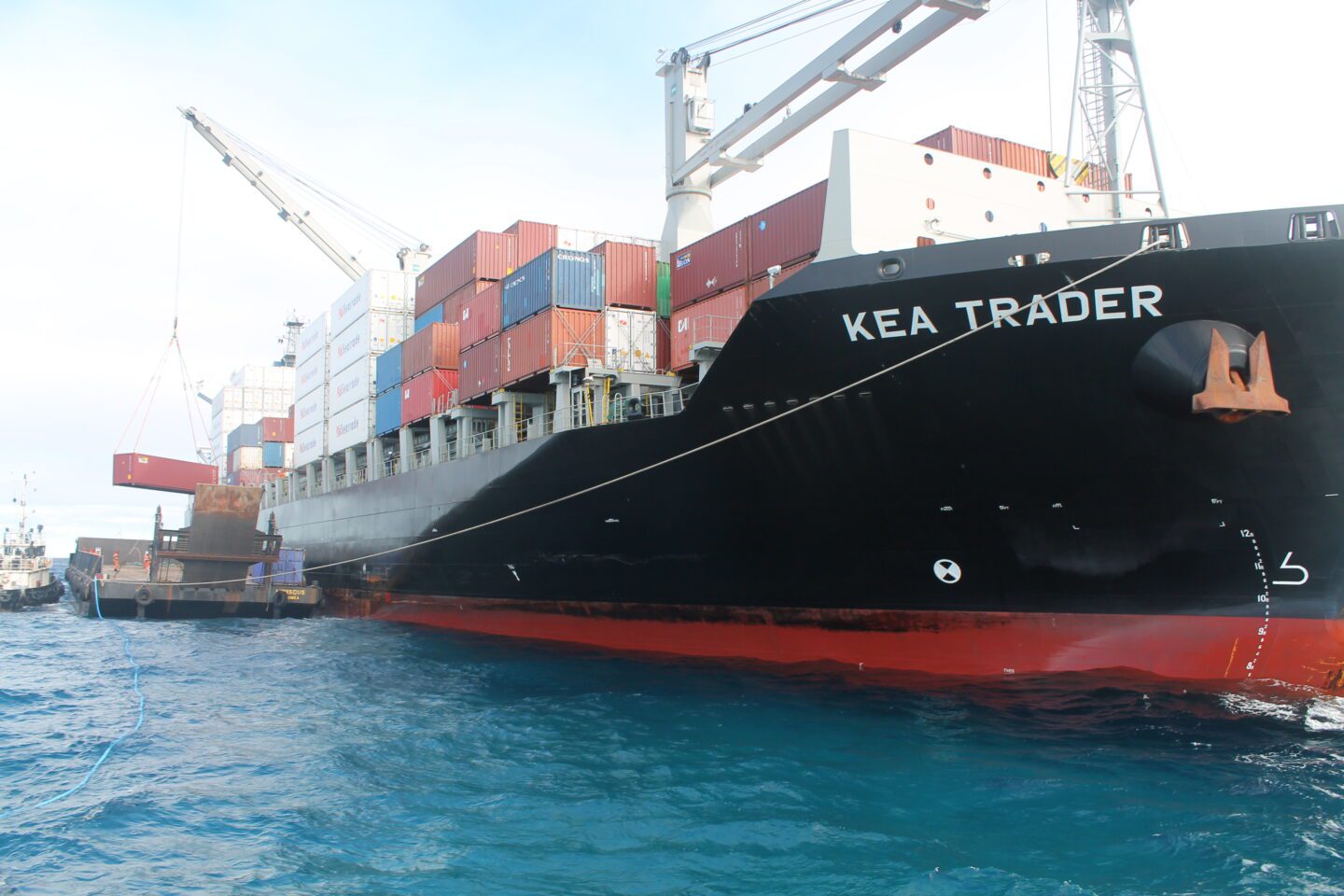 a photo of a container ship docked