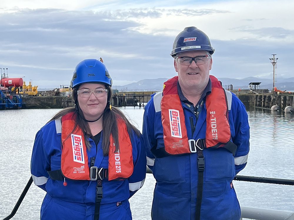 Briggs Marine Staff Wearing PLB Life Jackets