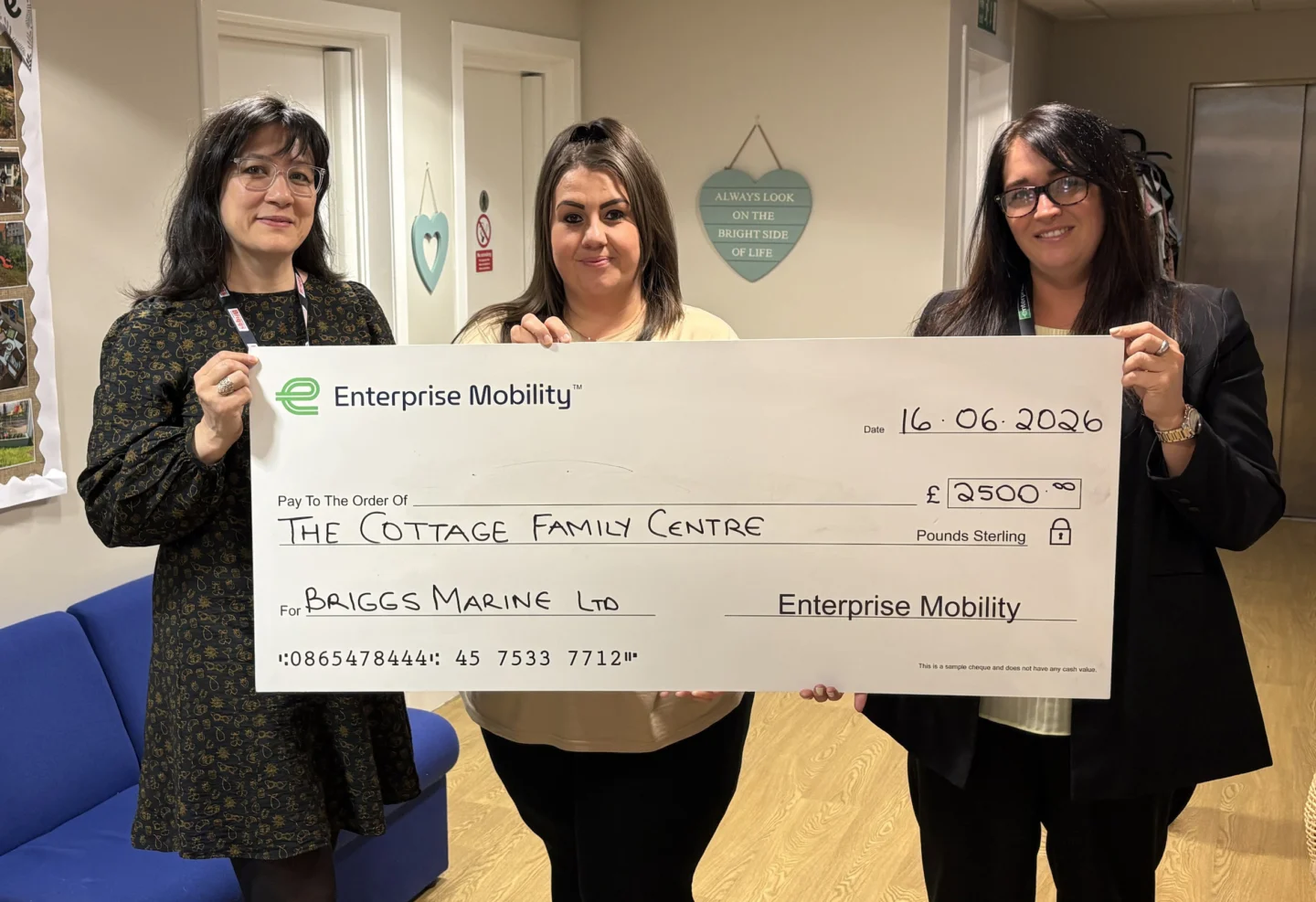 Enterprise Mobility and Briggs Marine present The Cottage Family Centre with a Cheque